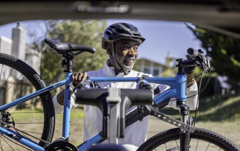 Summit-Financial-of-South-Carolina-senior-man-with-mountain-bike-smiling Financial Services